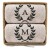 prezent-na-slub-2-reczniki-w-koszu-monogram-z-lisciem-laurowym-piaskowy.jpg