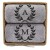 prezent-na-slub-2-reczniki-w-koszu-monogram-z-lisciem-laurowym-szary.jpg